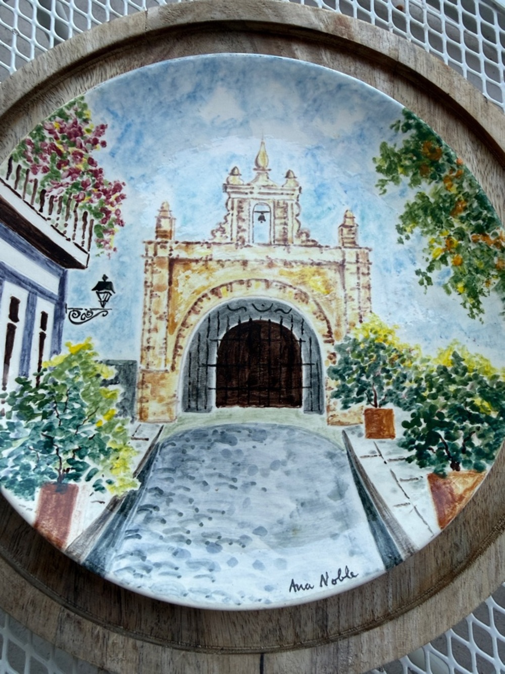 Hand-Painted Decorative Ceramic Plate with Archway Scene